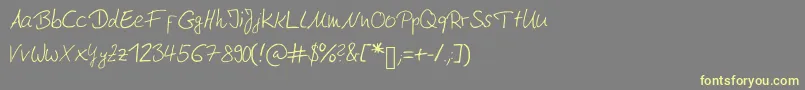 Moderngermanhandwriting Font – Yellow Fonts on Gray Background