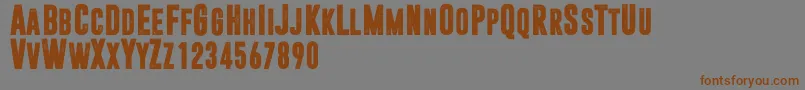 Dreamwalker-Schriftart – Braune Schriften auf grauem Hintergrund