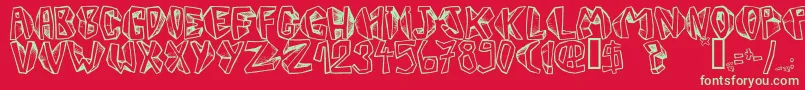 Fonte Barbtwistedblocks – fontes verdes em um fundo vermelho