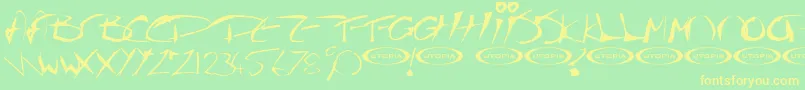 The Guru Font Font – Yellow Fonts on Green Background