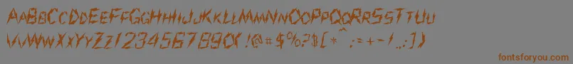 フォントJoltRegular – 茶色の文字が灰色の背景にあります。