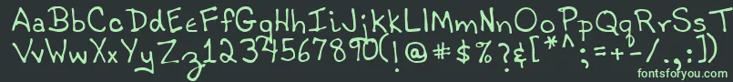 フォントTobyRegular – 黒い背景に緑の文字
