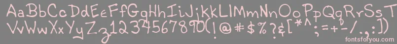フォントTobyRegular – 灰色の背景にピンクのフォント