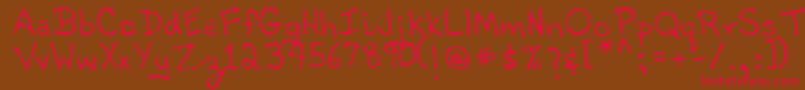 フォントTobyRegular – 赤い文字が茶色の背景にあります。