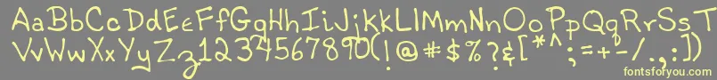 TobyRegular-fontti – keltaiset fontit harmaalla taustalla