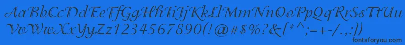 IsadoraCyr Font – Black Fonts on Blue Background