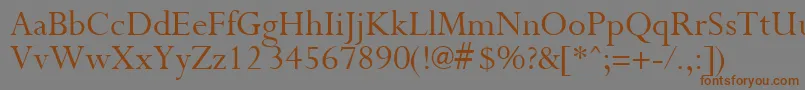 フォントPurloinRegular – 茶色の文字が灰色の背景にあります。