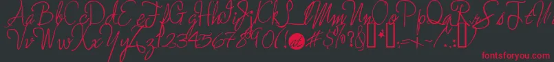 Saiba mais sobre a fonte Moreenchanted Fonte Moreenchanted – fontes vermelhas em um fundo preto