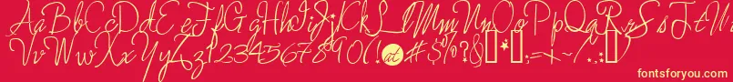 Moreenchanted Font – Yellow Fonts on Red Background