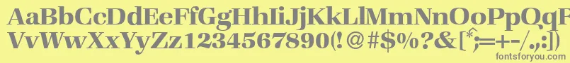 ZabriskiebookBold-fontti – harmaat kirjasimet keltaisella taustalla