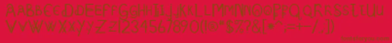 Schizcase Font – Brown Fonts on Red Background