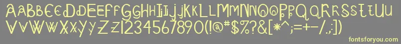 Schizcase Font – Yellow Fonts on Gray Background