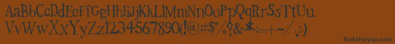 フォントTimesNewRandom – 黒い文字が茶色の背景にあります