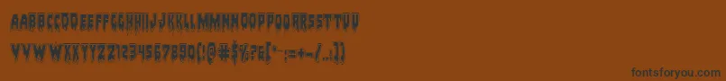 Bloodlustacad-Schriftart – Schwarze Schriften auf braunem Hintergrund