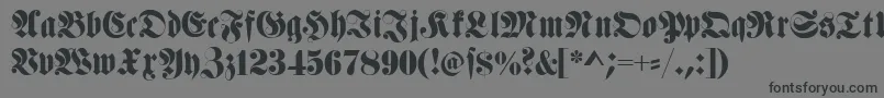 Fettehaenelfraktur-Schriftart – Schwarze Schriften auf grauem Hintergrund