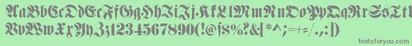 fuente Fettehaenelfraktur – Fuentes Grises Sobre Fondo Verde