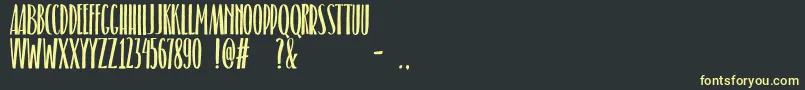 Belacu Font – Yellow Fonts on Black Background