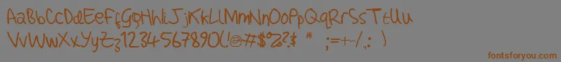 AdamHandwritingTest Font – Brown Fonts on Gray Background