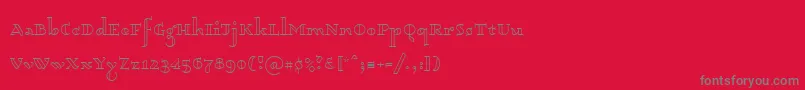 Dagerotypos-fontti – harmaat kirjasimet punaisella taustalla