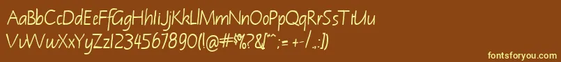 NotehandleftyBoldItalic Font – Yellow Fonts on Brown Background