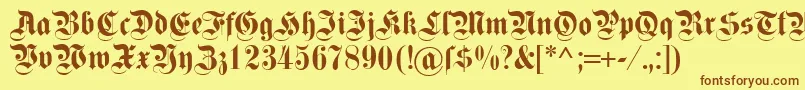 Dsfettekanzlei-Schriftart – Braune Schriften auf gelbem Hintergrund