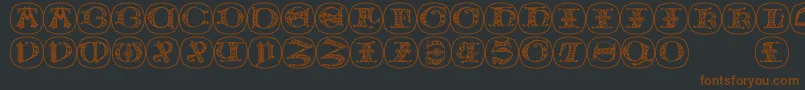 Uncialbuttonsb-fontti – ruskeat fontit mustalla taustalla