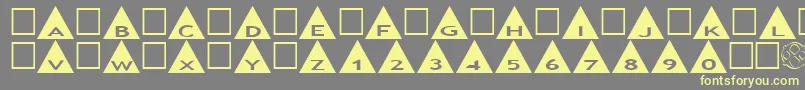 フォントAlphashapesTriangles – 黄色のフォント、灰色の背景