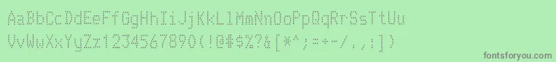 Czcionka TelidoninkrgRegular – szare czcionki na zielonym tle