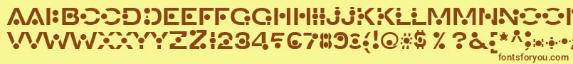 フォントAncreon – 茶色の文字が黄色の背景にあります。