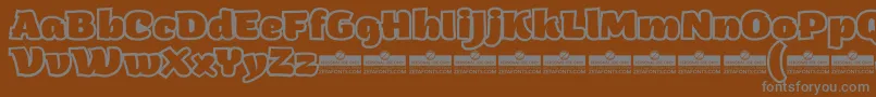 フォントArturoHeavyOutlineTrial – 茶色の背景に灰色の文字