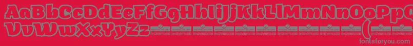 ArturoHeavyOutlineTrial-Schriftart – Graue Schriften auf rotem Hintergrund