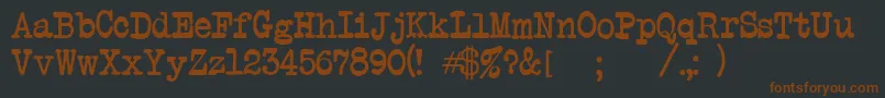 Atwriter Font – Brown Fonts on Black Background