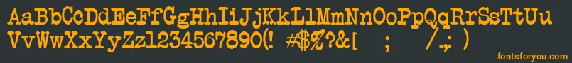 Atwriter Font – Orange Fonts on Black Background