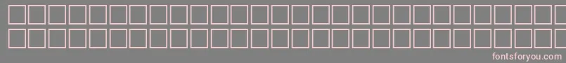 フォントNietzscheRegular – 灰色の背景にピンクのフォント