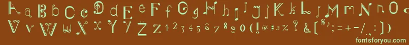 フォントMusikerSingle – 緑色の文字が茶色の背景にあります。