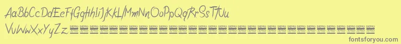 Шрифт RiotiksDemo – серые шрифты на жёлтом фоне