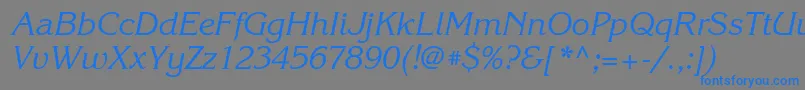 KorinnacttItalic-Schriftart – Blaue Schriften auf grauem Hintergrund