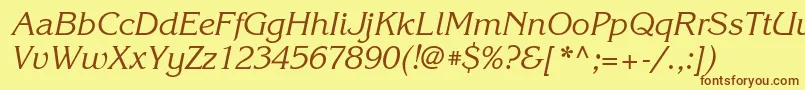 フォントKorinnacttItalic – 茶色の文字が黄色の背景にあります。