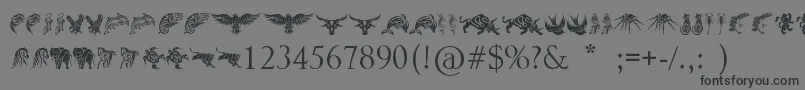 Weitere Informationen zur TribalAnimalsTattooDesigns-Schriftart TribalAnimalsTattooDesigns-Schriftart – Schwarze Schriften auf grauem Hintergrund