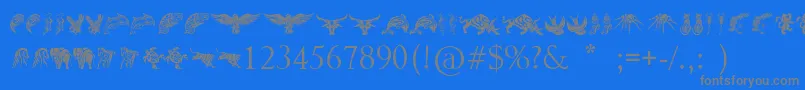 TribalAnimalsTattooDesigns-Schriftart – Graue Schriften auf blauem Hintergrund