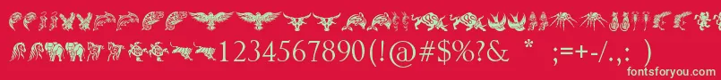TribalAnimalsTattooDesigns-Schriftart – Grüne Schriften auf rotem Hintergrund