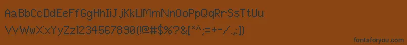 フォントPixelUnicode – 黒い文字が茶色の背景にあります