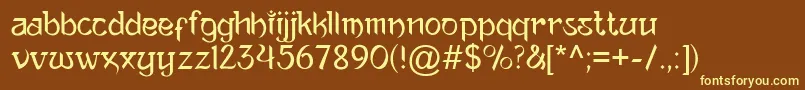 AnandaNeptouch-fontti – keltaiset fontit ruskealla taustalla