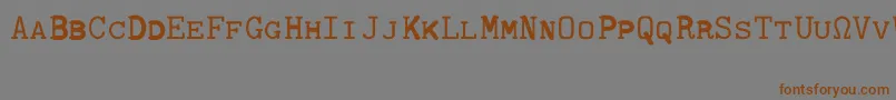 CmTypewritercapsRegular Font – Brown Fonts on Gray Background