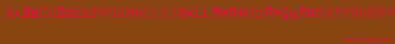 CmTypewritercapsRegular-Schriftart – Rote Schriften auf braunem Hintergrund
