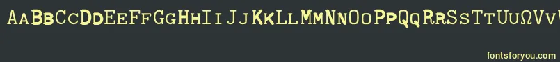 Шрифт CmTypewritercapsRegular – жёлтые шрифты на чёрном фоне