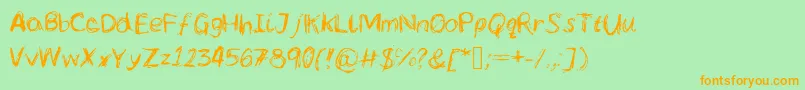 Lcscribbles-Schriftart – Orangefarbene Schriften auf grünem Hintergrund