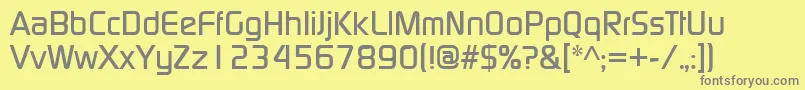 Contm-fontti – harmaat kirjasimet keltaisella taustalla