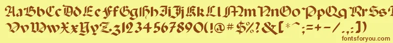 フォントPaladinrus – 茶色の文字が黄色の背景にあります。