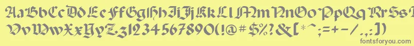 フォントPaladinrus – 黄色の背景に灰色の文字